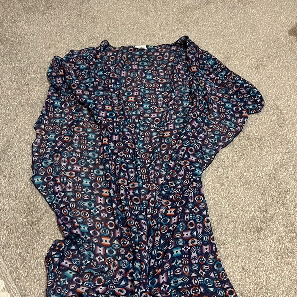 Lularoe size medium sweater, never worn with fun print!